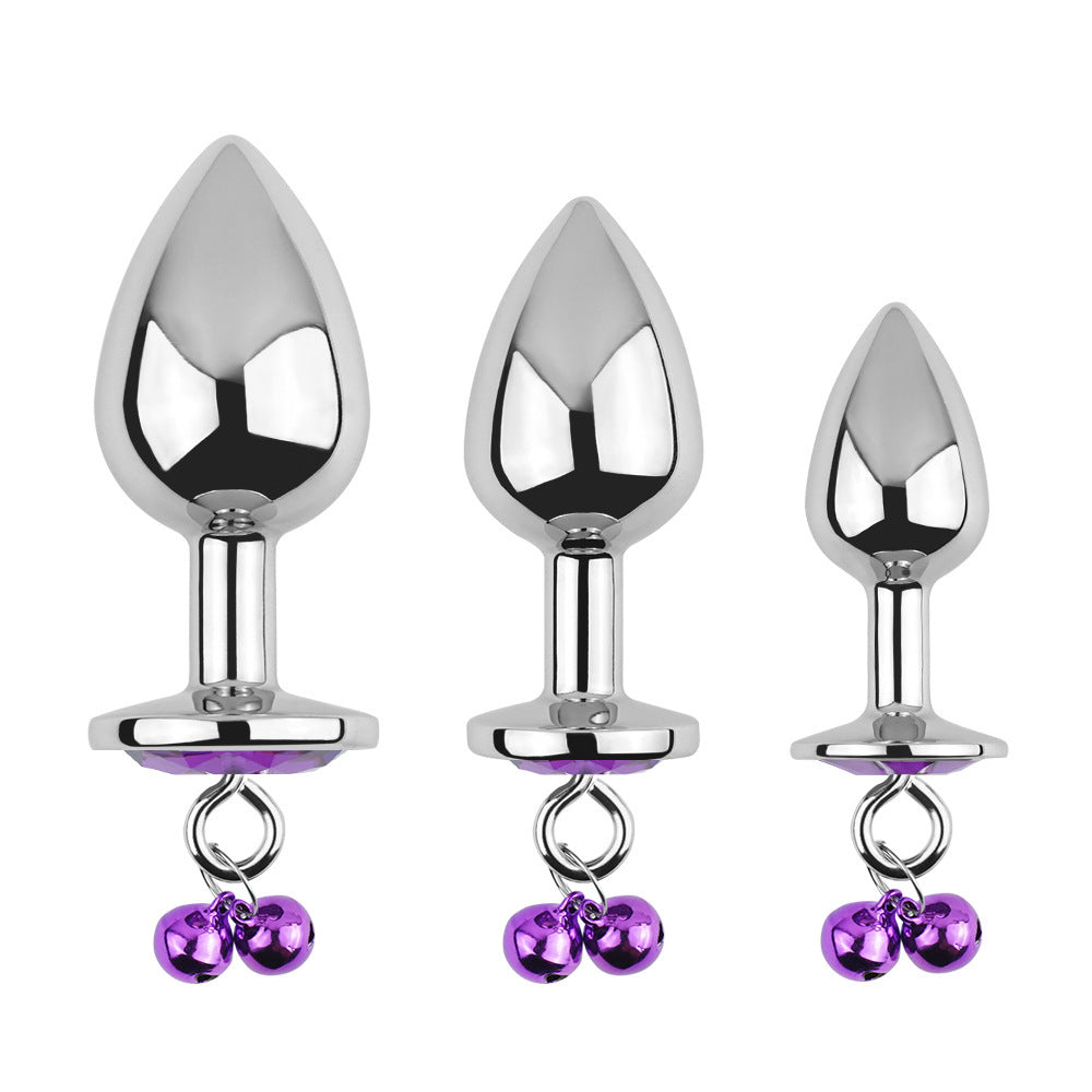 Plug anal violet avec bijoux, cloches et laisse