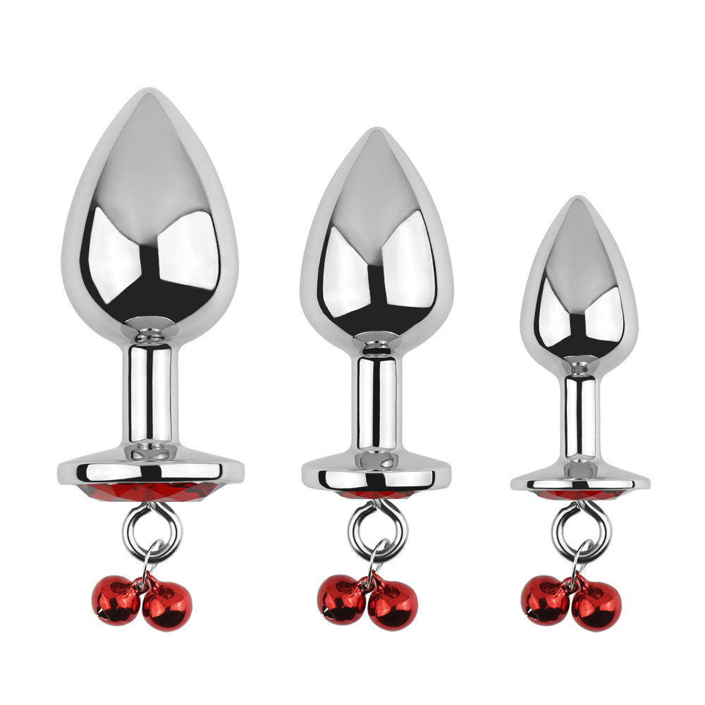 Plug anal rouge avec bijoux, cloches et laisse