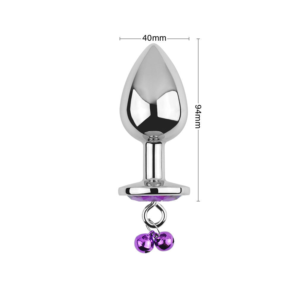 Plug anal violet avec bijoux, cloches et laisse
