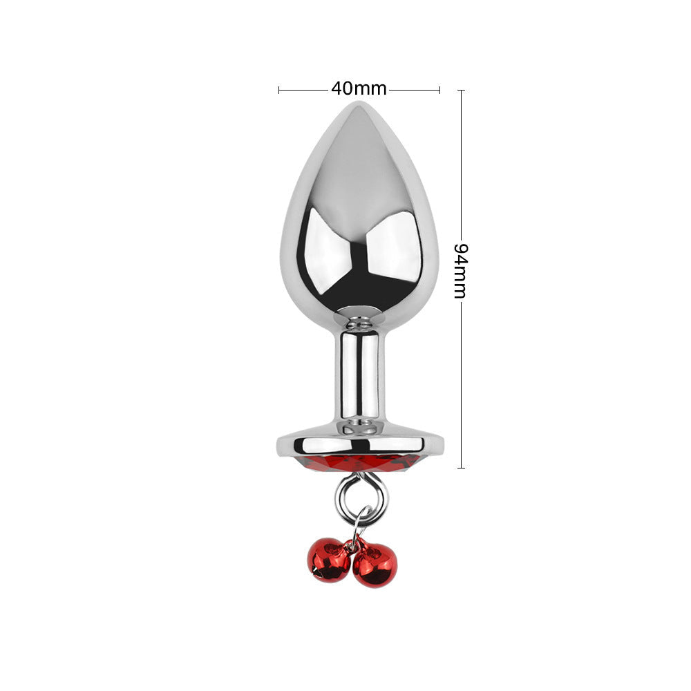 Plug anal rouge avec bijoux, cloches et laisse
