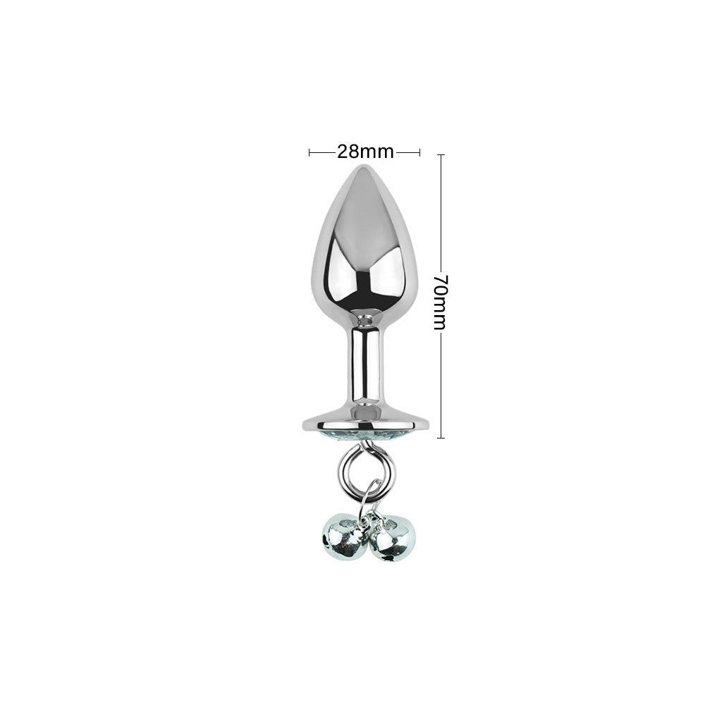 Plug anal blanc avec bijoux, cloches et laisse