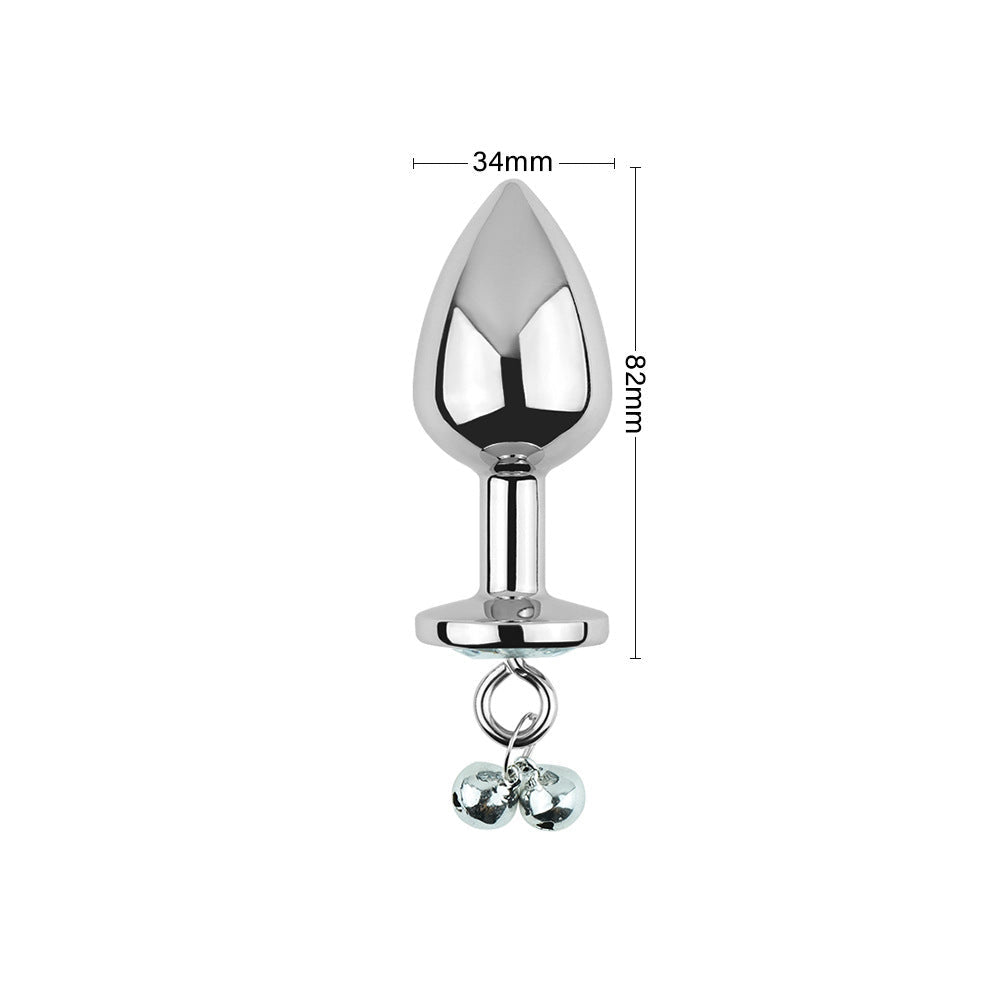 Plug anal blanc avec bijoux, cloches et laisse