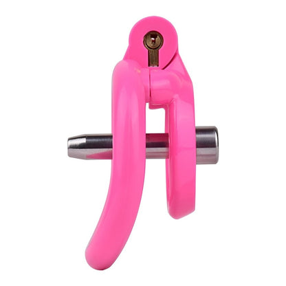 "Compact pink chastity cage designed for sissy cuckold and chastity training sessions."