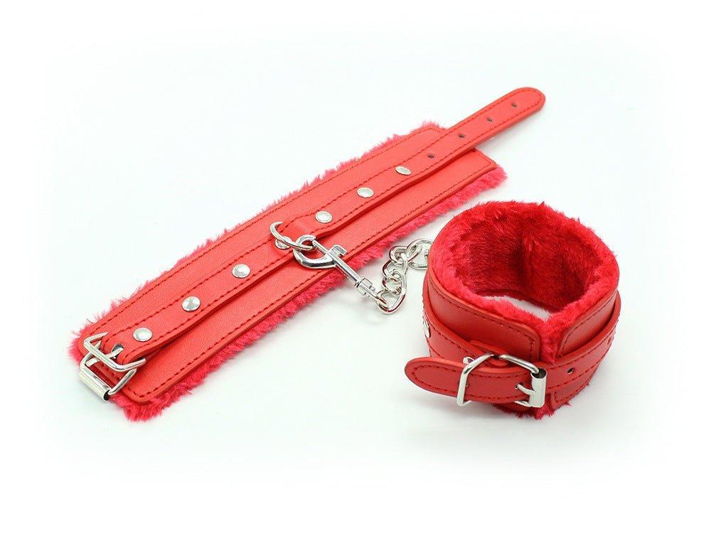 Red fur-lined BDSM handcuffs and restraint