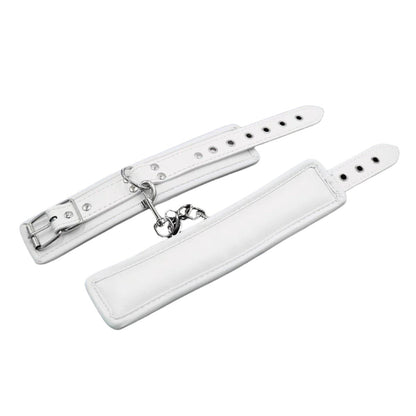 White BDSM wrist restraints with silver buckle